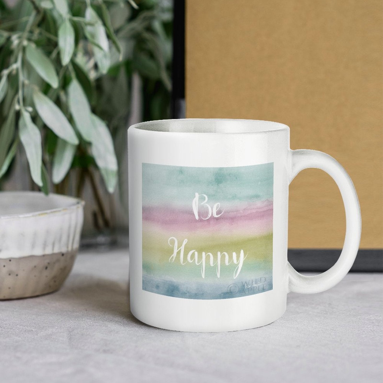 White ceramic mug with "Be Happy" watercolor design. Customizable gift idea for daily use. Made in USA. Perfect gift.