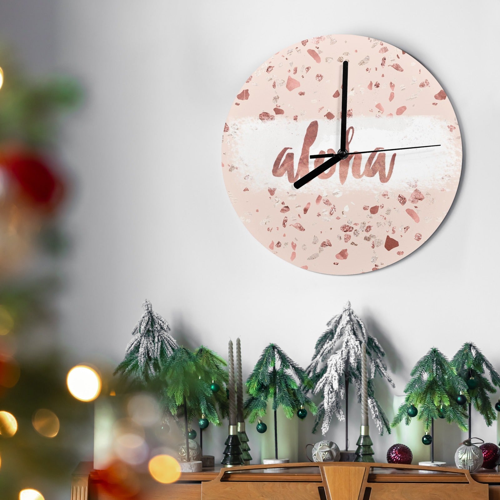 Pink terrazzo MDF wall clock with Aloha text. Modern decor for living room, kitchen, or office