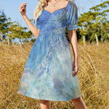 Women's summer mini dress with blue watercolor print, short sleeves, and casual style.