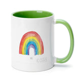 Personalized white ceramic Pride mug with rainbow design, green handle and interior, customizable gift from MyArtsyGift.