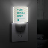 Customizable LED night light with 'YOUR DESIGN HERE' text, perfect for bathroom/bedroom. Energy-saving design.