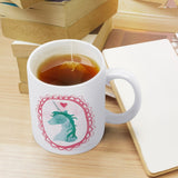 White ceramic Unicorn Magic II mug with tea, perfect customizable gift, home or office.