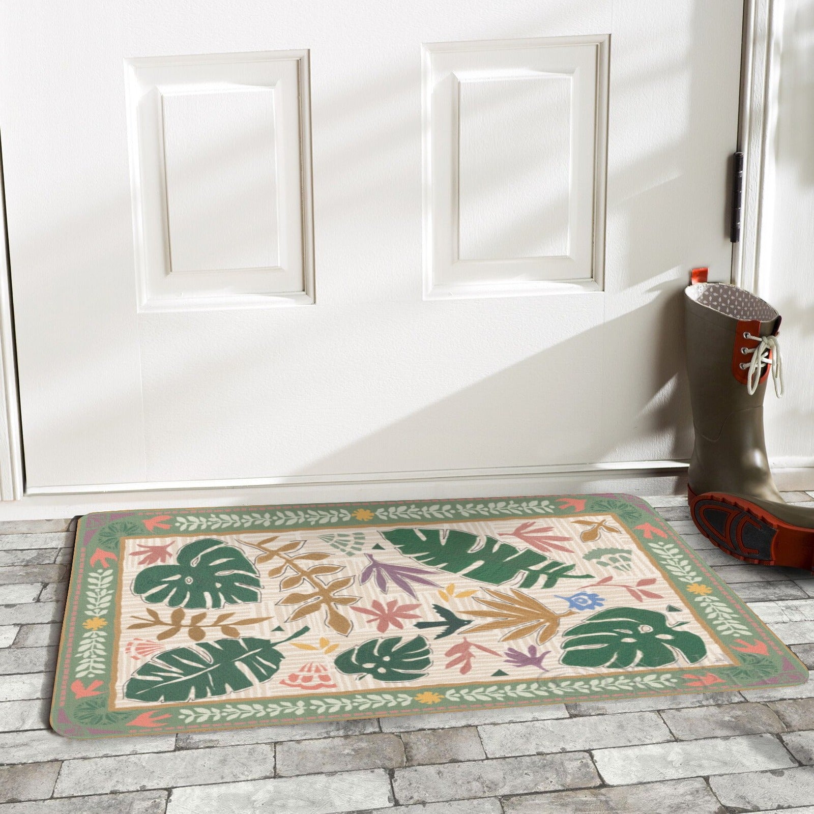 Desert-themed door mat with tropical leaf patterns, perfect for indoor or outdoor use