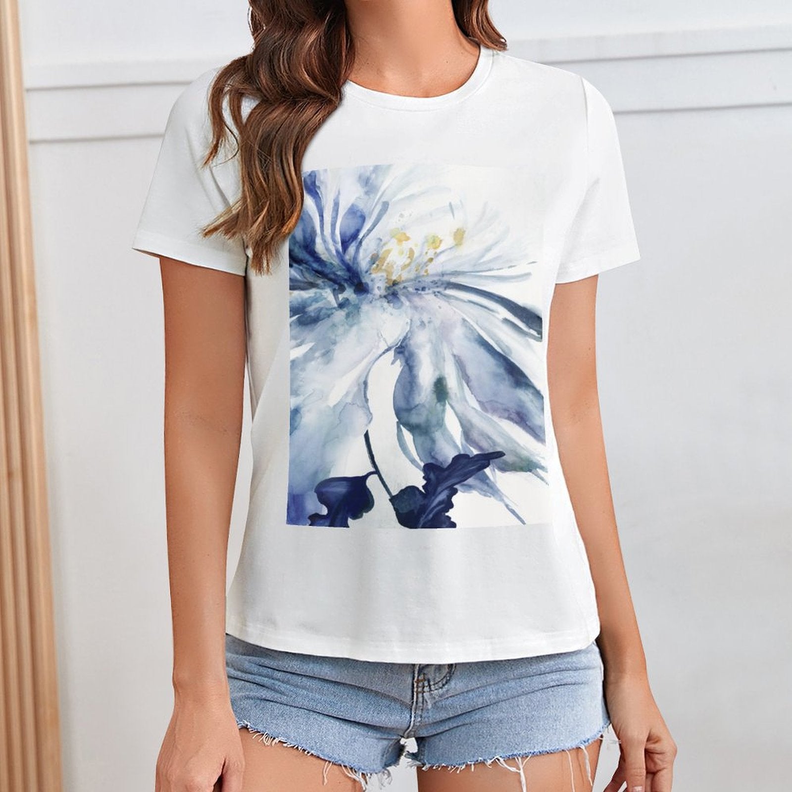 Women's white t-shirt with blue watercolor floral print; MyArtsyGift design, artistic and unique style.