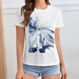 Women's white t-shirt with blue watercolor floral print; MyArtsyGift design, artistic and unique style.