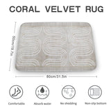 Coral velvet bath rug with abstract design, non-slip, absorbent, and quick-drying for bathroom or kitchen.