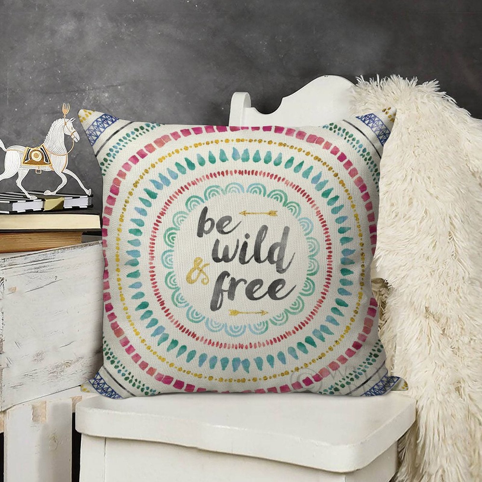 Linen throw pillow case with 'be wild & free' text, mandala design, and colorful accents, for living room decor.