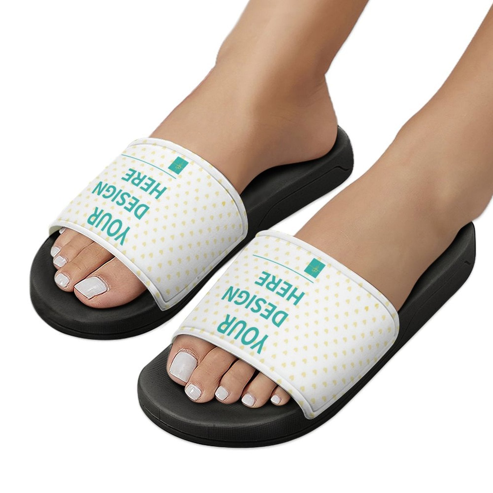 Personalized slide slippers with 'YOUR DESIGN HERE' design on white strap, black sole, PVC material, for men and women.