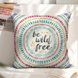 Linen pillow case with colorful mandala design and "be wild & free" text, home decor.