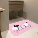 Pink dog doormat featuring a cartoon dachshund on a skateboard, indoor or outdoor use