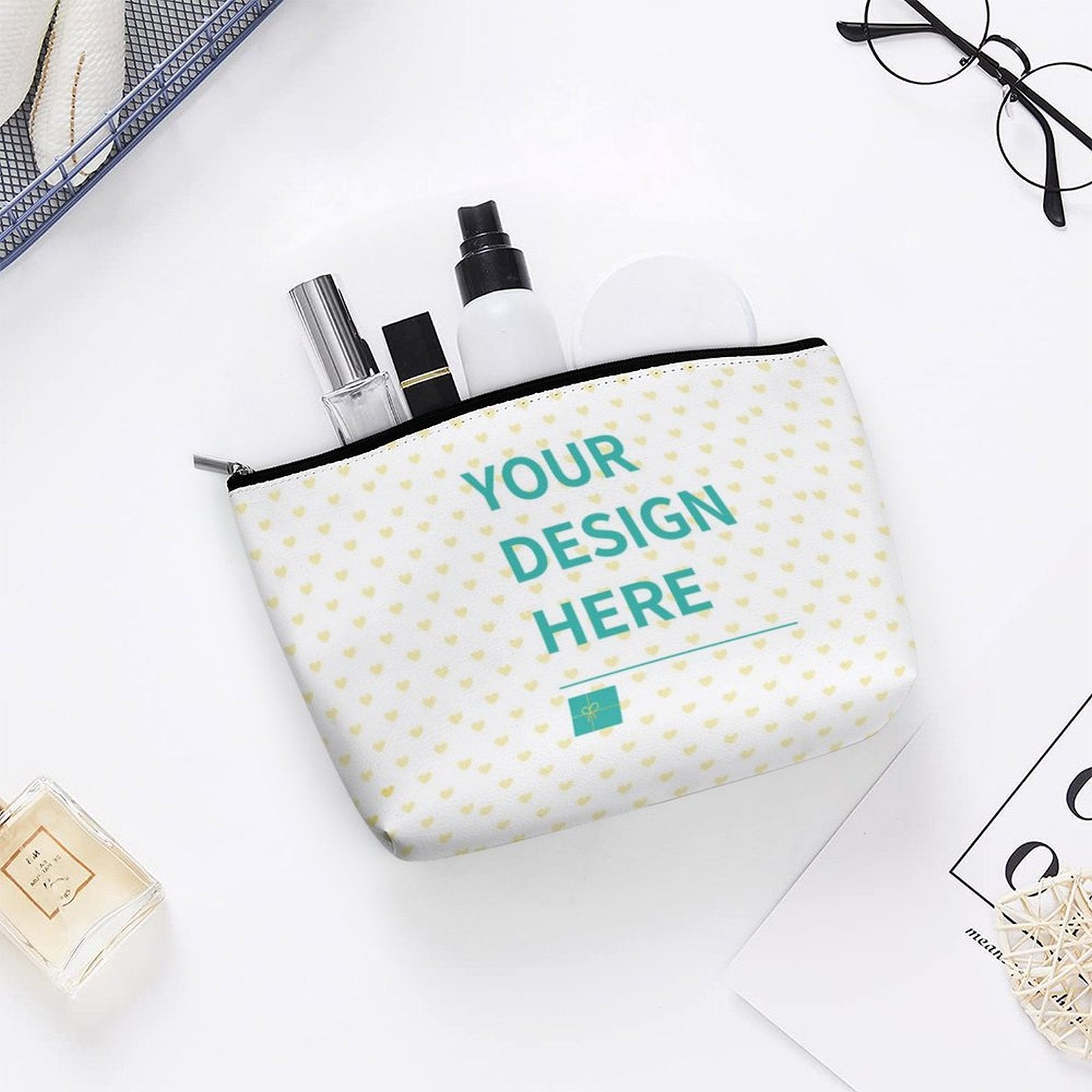 Custom makeup bag with heart pattern and 'YOUR DESIGN HERE', personalized cosmetic storage for women.