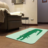 Crocodile door mat for indoor/outdoor use, green cartoon design, with WILD text, durable rubber floor mat
