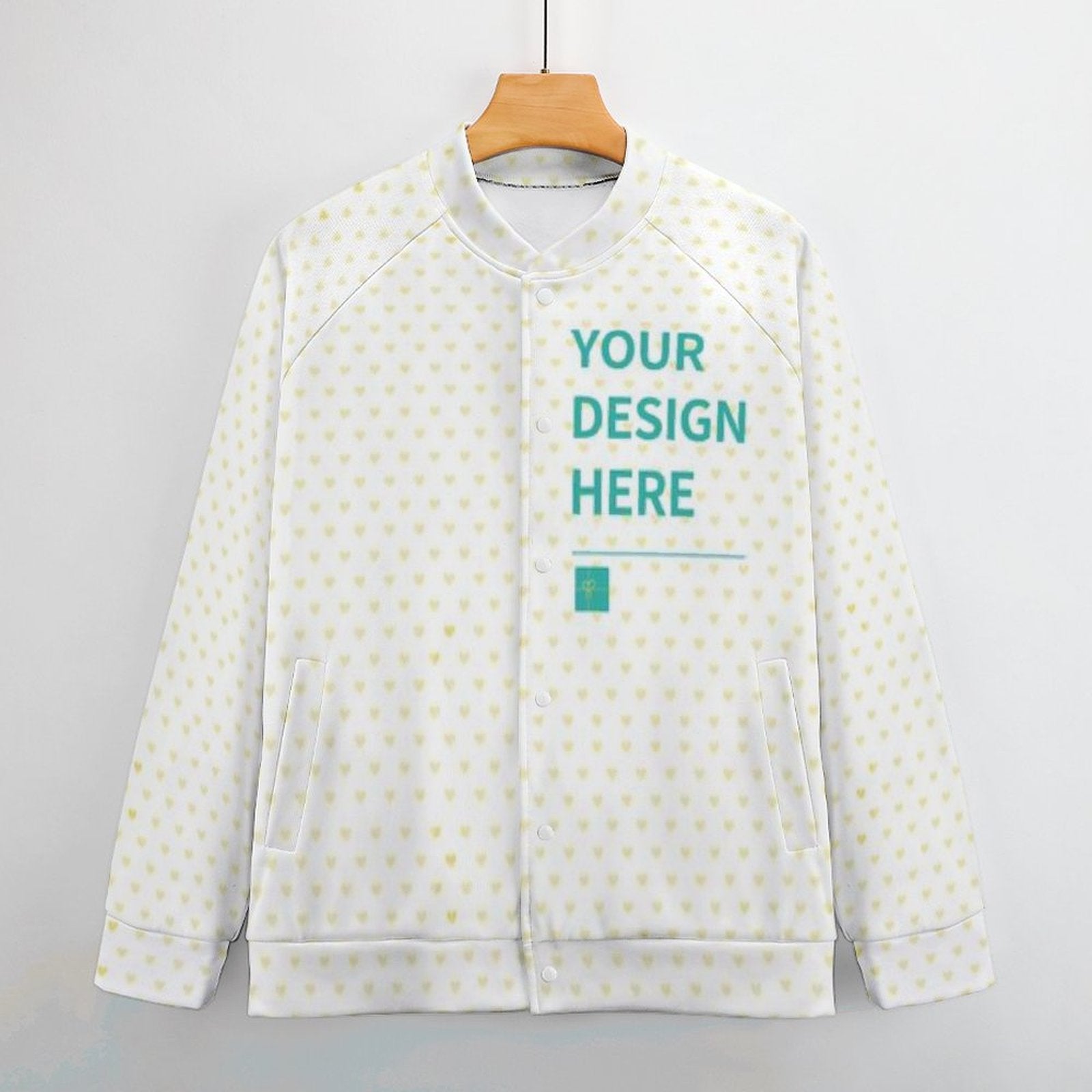 Customizable white baseball jacket with heart pattern and 'YOUR DESIGN HERE' text, perfect for personalized gifts.