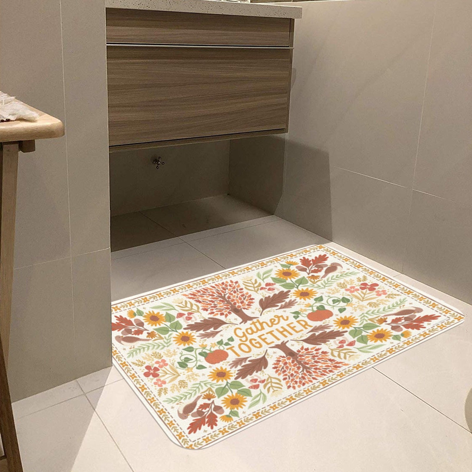 Autumn doormat with Gather Together text, fall leaves and floral design; indoor/outdoor mat