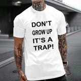 White Gildan Unisex T-shirt with "DON'T GROW UP IT'S A TRAP!" print - Comfortable cotton tee