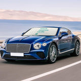 Custom car sunshade for front windshield featuring customizable design, text "YOUR DESIGN HERE", made of PG Cloth, blue car.