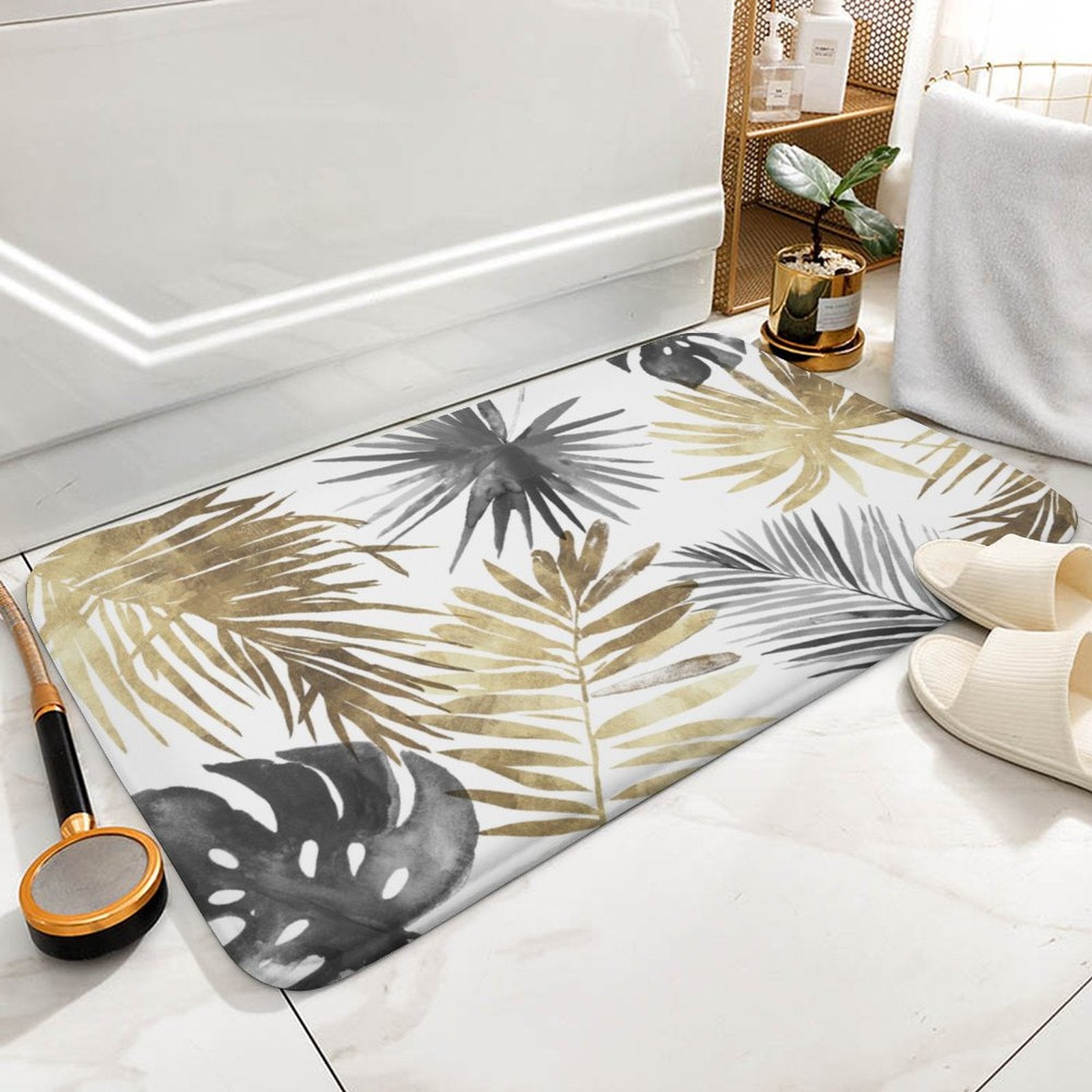 Coral velvet bath rug with gold, gray, and black tropical leaf pattern for bathroom or kitchen