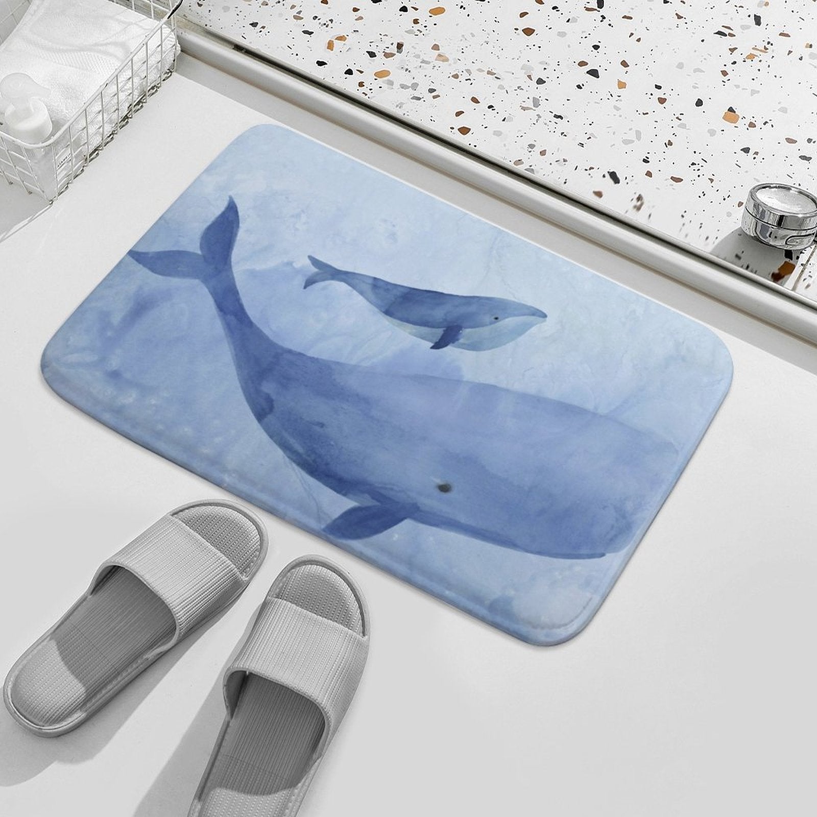 Coral velvet bath rug with blue whale watercolor design, non-slip bathroom mat