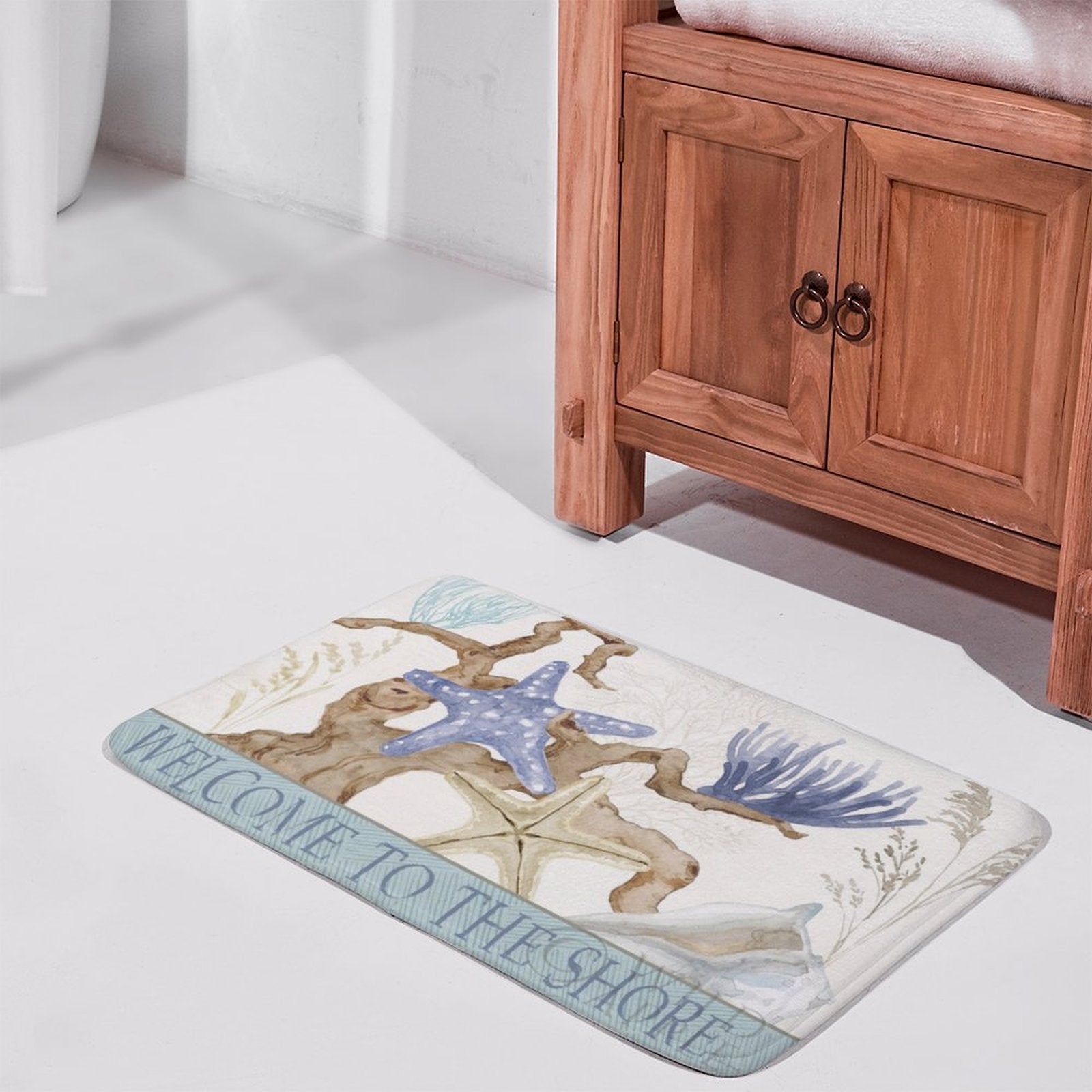 Coastal bath rug with welcome message, non-slip, absorbent, and quick-drying for bathroom decor
