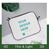 Custom laptop sleeve featuring 'YOUR DESIGN HERE' on snowflake fabric, thin and light design for personalization.