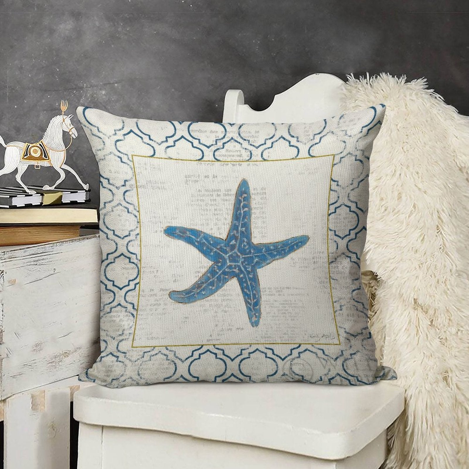 Linen throw pillow case with blue starfish design for living room decor. Made in USA.