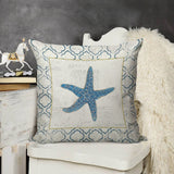 Linen throw pillow case with blue starfish design for living room decor. Made in USA.