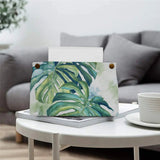 PU tissue box cover with monstera leaf print. Stylish facial tissue holder for home or office