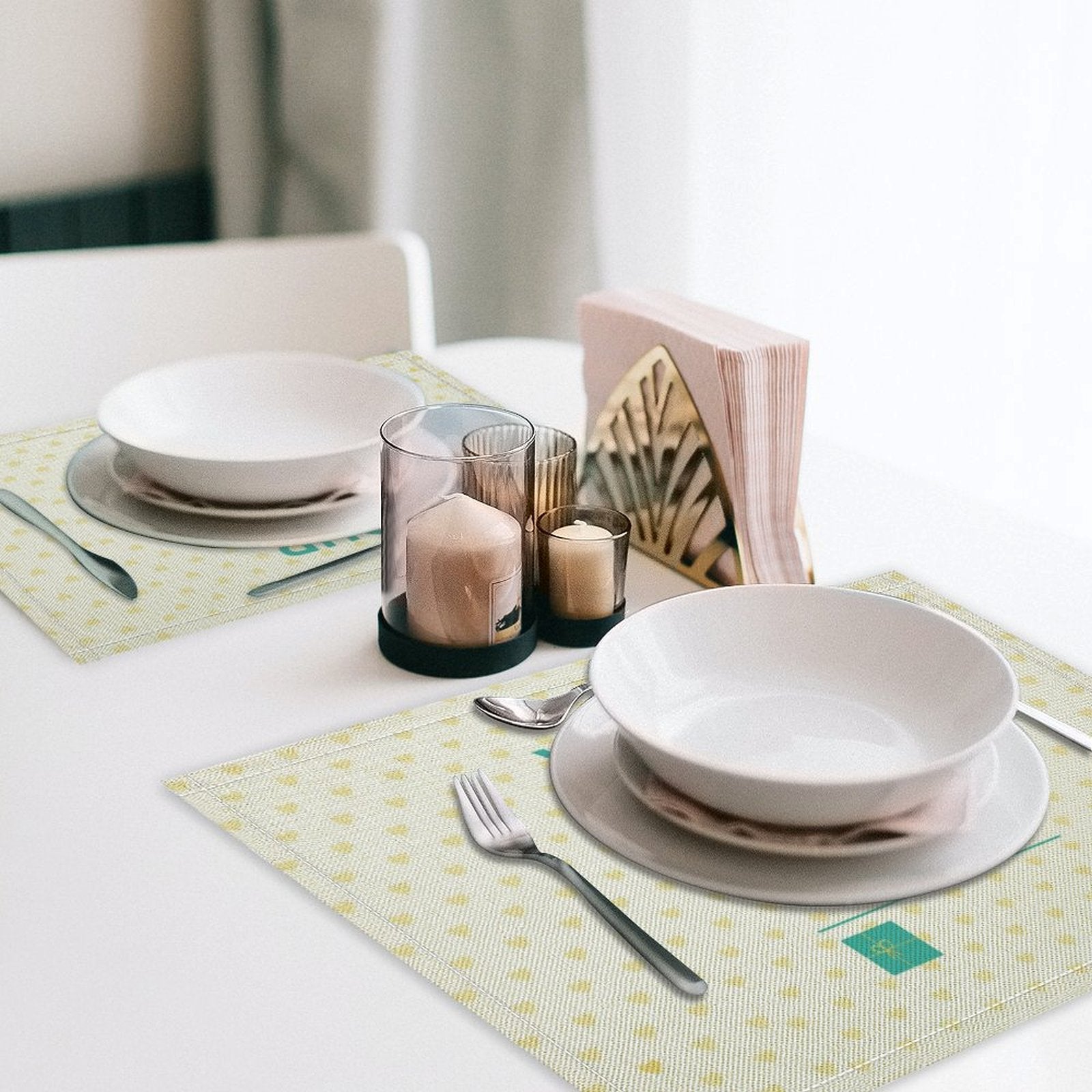 Flax placemat dining table set with plates, silverware, and candles for dining decor