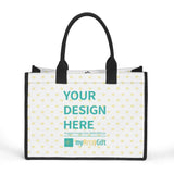 Customizable canvas tote bag with black handles and heart pattern, perfect for carrying and gifting