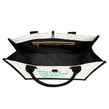 Customizable canvas tote bag with 'Your Design Here' text from MyArtsyGift. Premium all-over print tote bag for women.