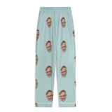 Custom personalized pajama pants with a repeating face pattern in light blue. Soft and breathable sleepwear.