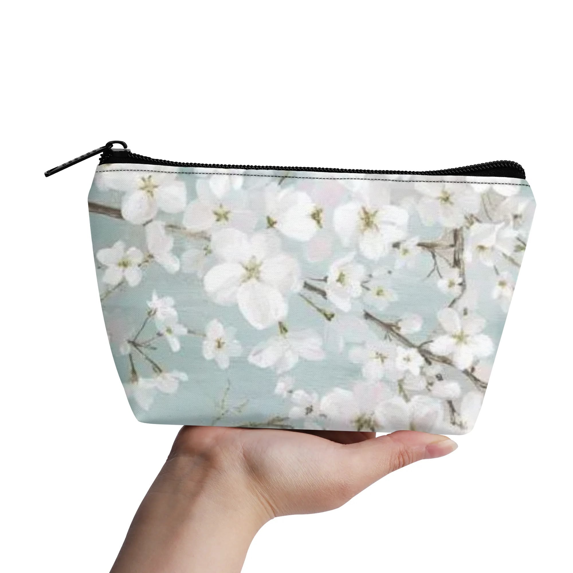 Floral wristlet bag, 300D polyester, zipper closure, makeup travel cosmetic bag, held in hand