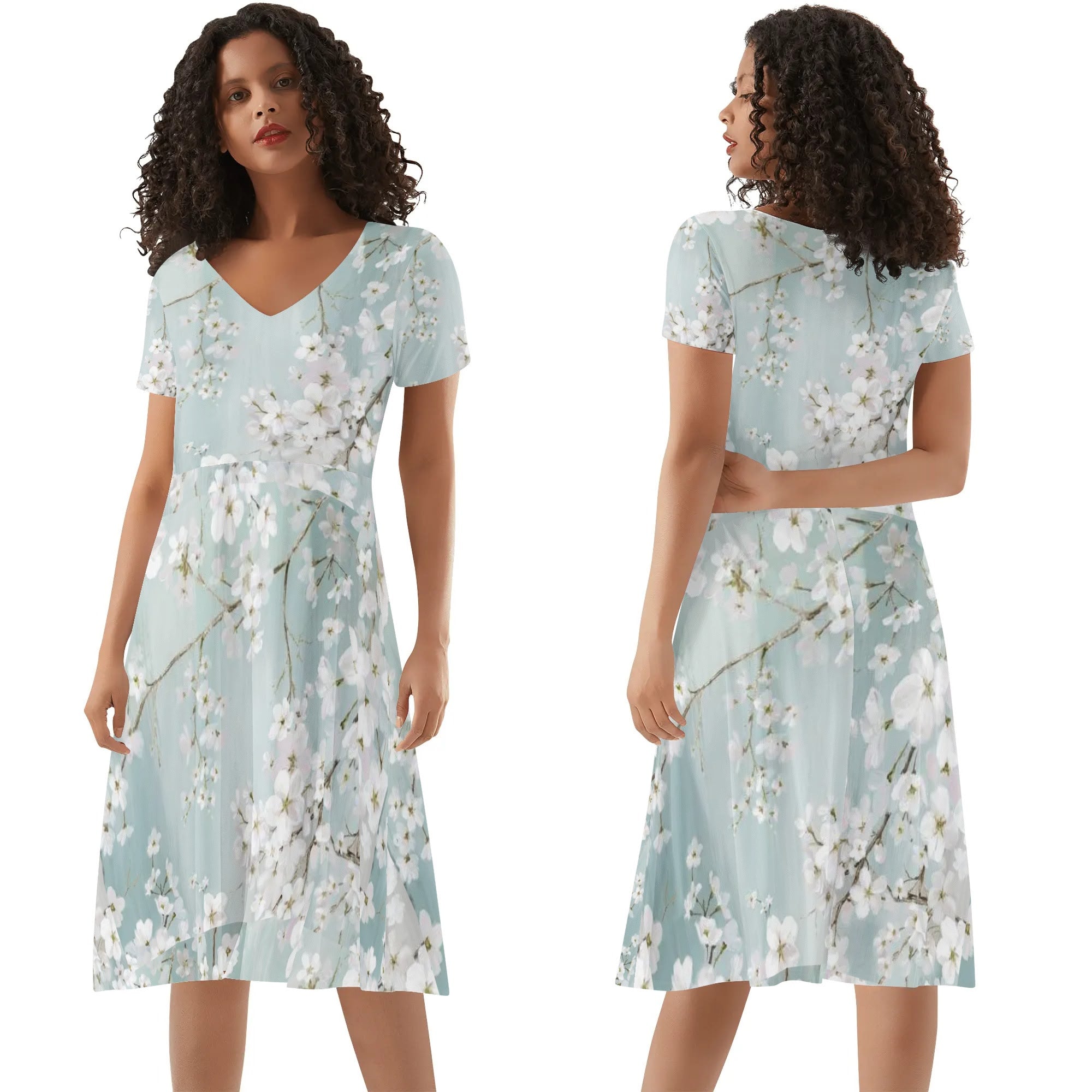 Womens V-neck summer dress with plum blossom print in light blue. Short sleeve knee-length floral dress.