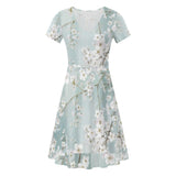 Womens summer dress V-neck with plum blossom print in light blue. Knee-length short sleeve floral dress.