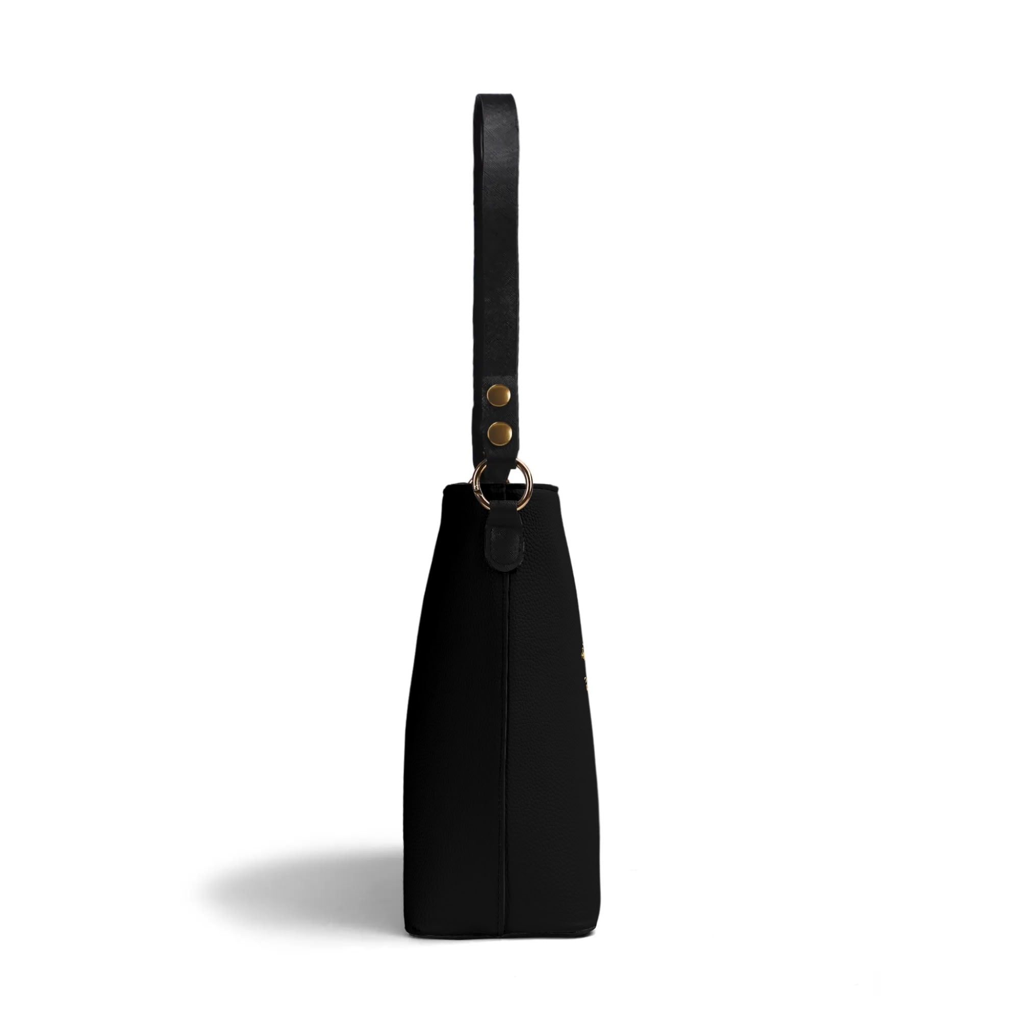 Black PU leather bucket bag, side view, with a handle, gold hardware, travel tote shoulder bag