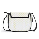 White PU leather crossbody purse with yellow heart pattern and black accents, ideal ladies saddle bag.