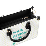 Customizable PU leather handbag with heart pattern, black handles, and text 'YOUR DESIGN HERE' - work bag