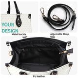 Personalized PU leather handbag with heart pattern, black handles, adjustable strap, and 'YOUR DESIGN' text