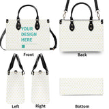 Personalized tote bag with yellow heart pattern, black handles, and 'YOUR DESIGN HERE' text, perfect gifts.