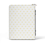 White PU leather Bible cover with yellow heart pattern, zippered closure, for men and women.