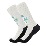 Custom socks with photos, personalized white socks with yellow hearts and black accents, and "R IGN E" in green.
