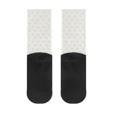 Customizable crew socks with yellow heart pattern and black accents, perfect for personalized gifts.