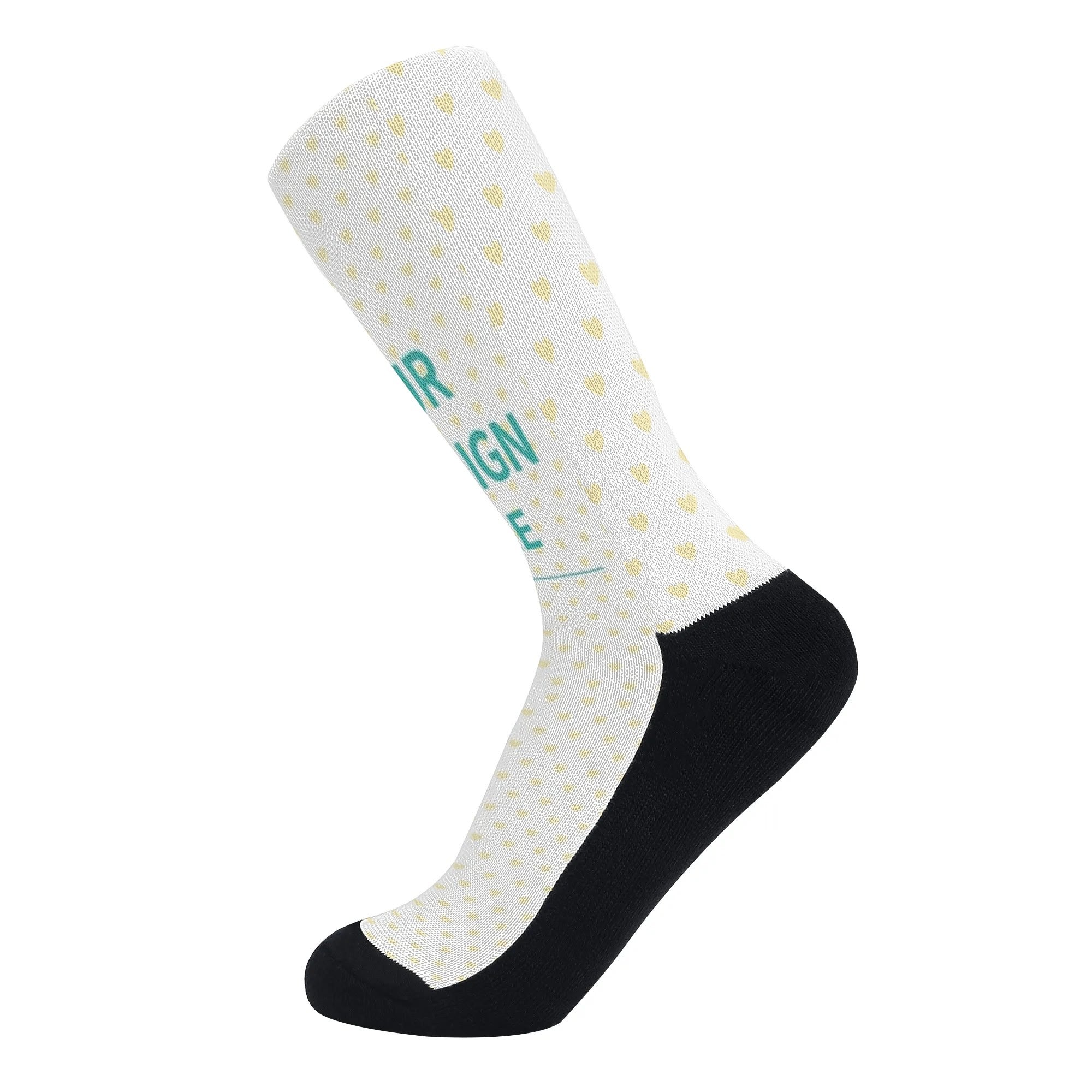 Custom crew socks with your design in white, yellow hearts, black accents, and "YOUR DESIGN HERE" text.