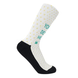 Custom crew sock with "YOUR DESIGN HERE", yellow hearts, and black accents, perfect for gifts.