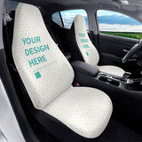 Personalized car seat covers. White fabric with yellow hearts, 'YOUR DESIGN HERE' text, car interior decor.