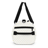 White gym bag with yellow heart pattern and black straps, personalized duffle bag.