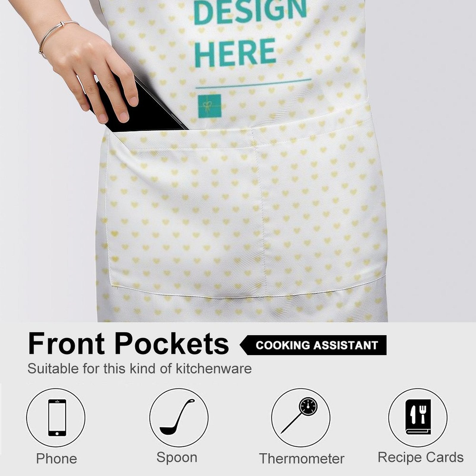 Customizable white cooking apron with pockets, heart pattern, and 'DESIGN HERE' text; perfect for kitchen and BBQ.