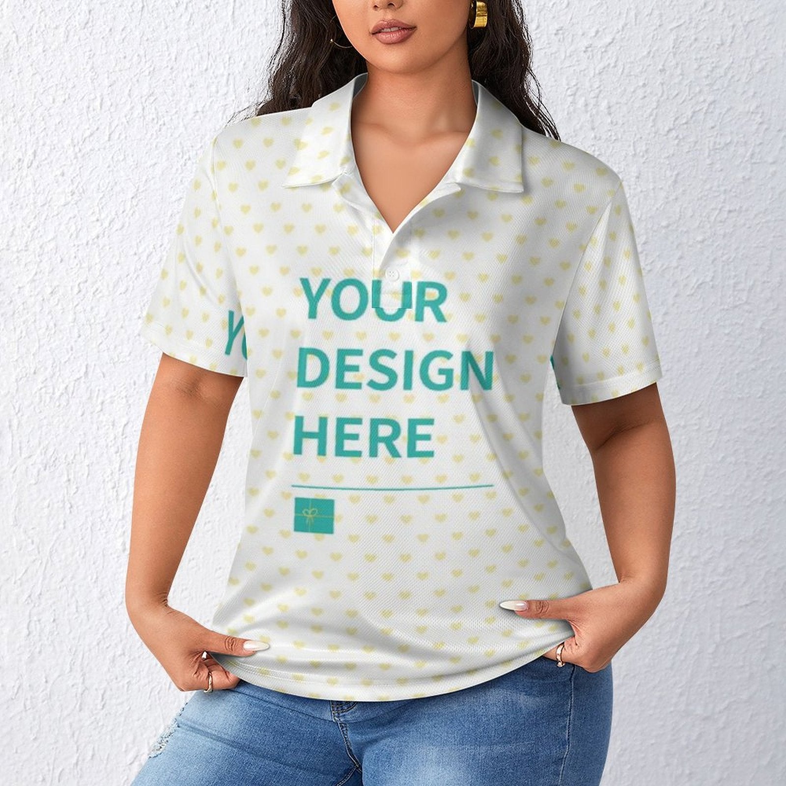 Customizable women's white polo shirt with heart pattern, featuring 'YOUR DESIGN HERE' text.