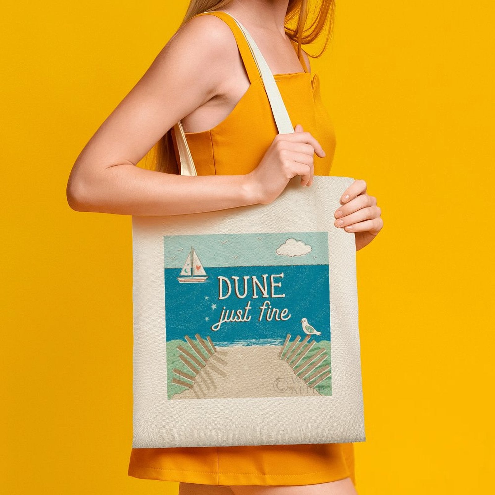 Canvas tote bag with "DUNE just fine" beach graphic; cloth shopping bag for women, made in USA.