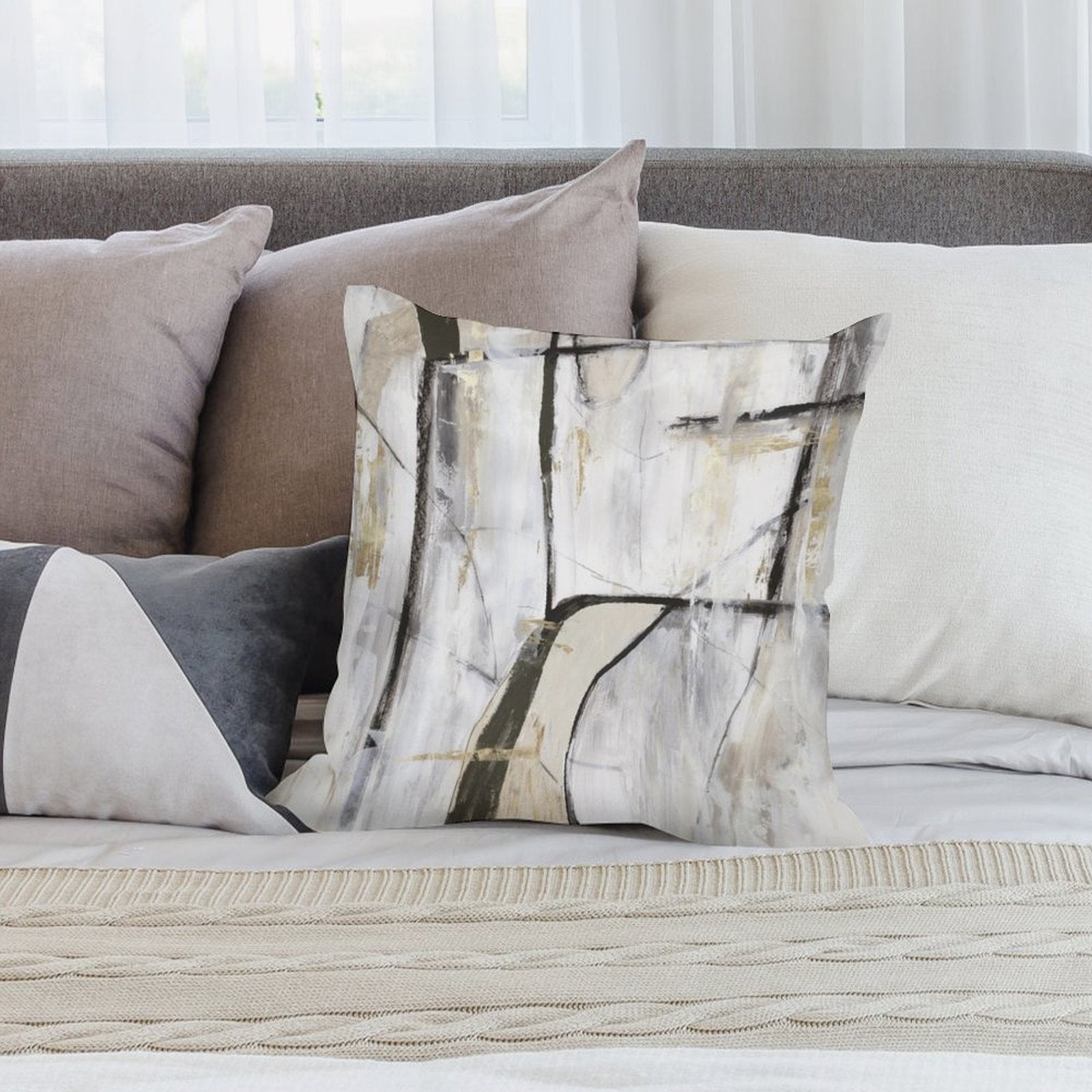 Abstract geometric plush pillow cover with black, gray, and gold art, perfect for sofa or couch.